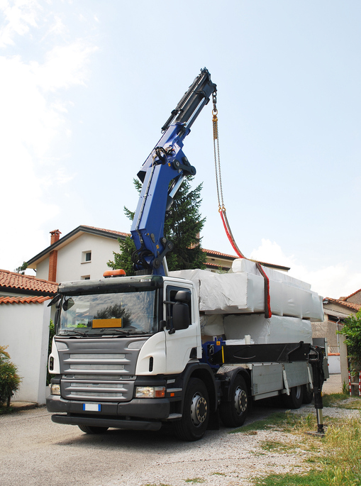 One of our HIAB Crane Lorries with its crane extended up