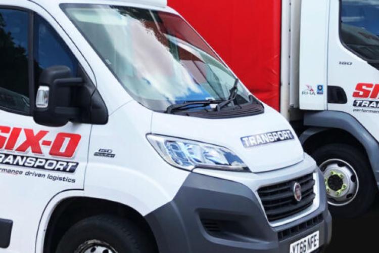 Three of our curtainside lorries lined up in the yard